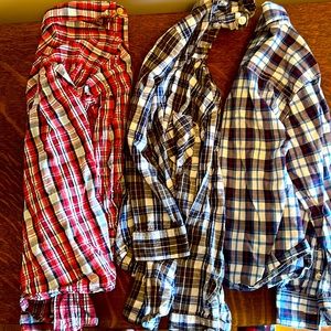 Three plaid shirts